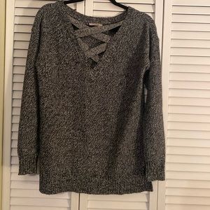Gray knit sweater with crossover cutout V-neck